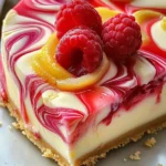 Luscious Lemon Raspberry Swirl Cheesecake
